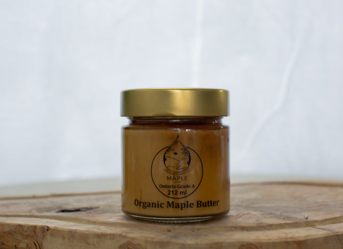212 ml jar centered in the image with a white background. Jar has a label with Beaver Valley Maple Syrup, Ontario Grade A Organic Maple Butter